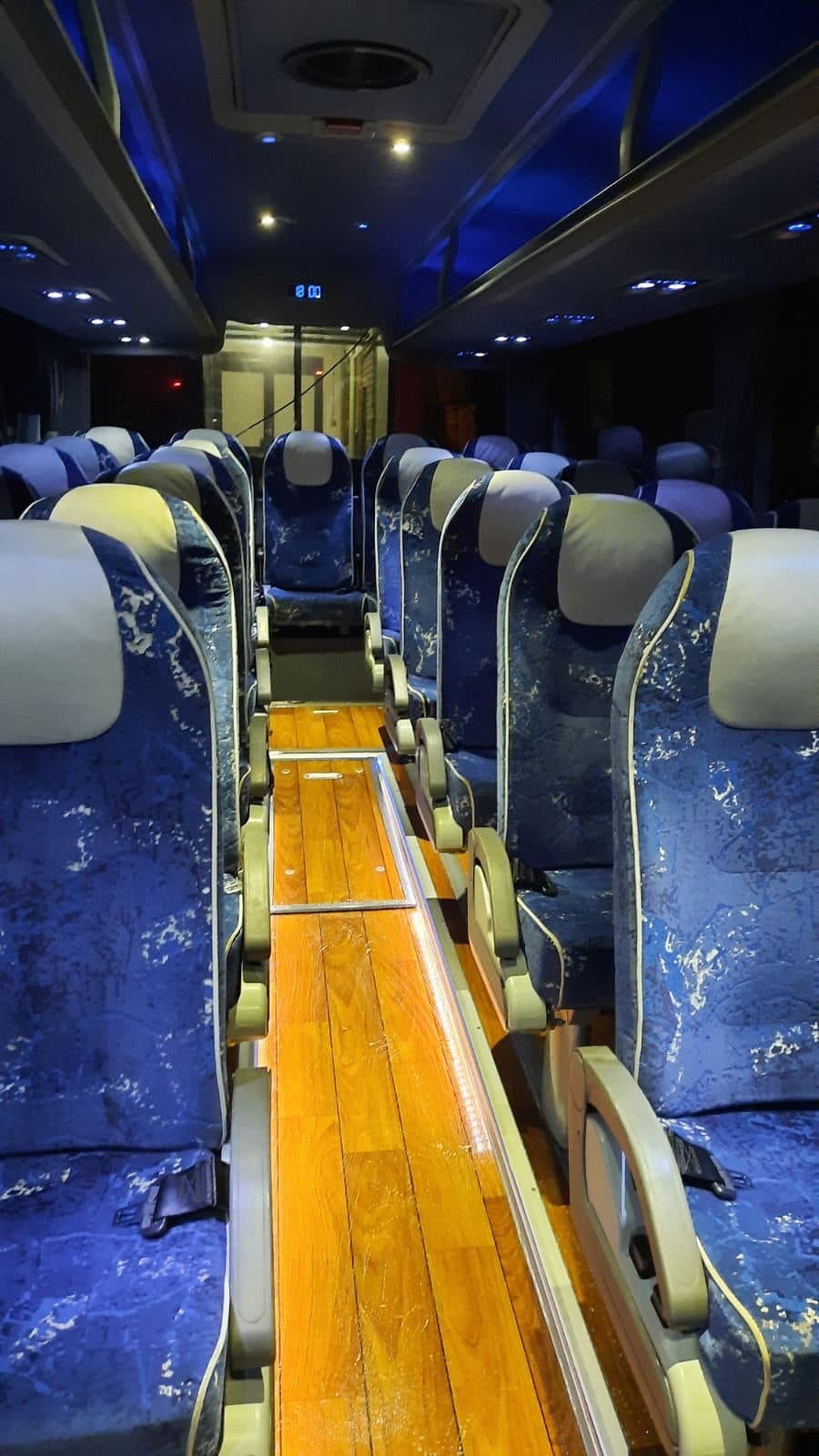 Aisle between the seats in the Van Hool coach