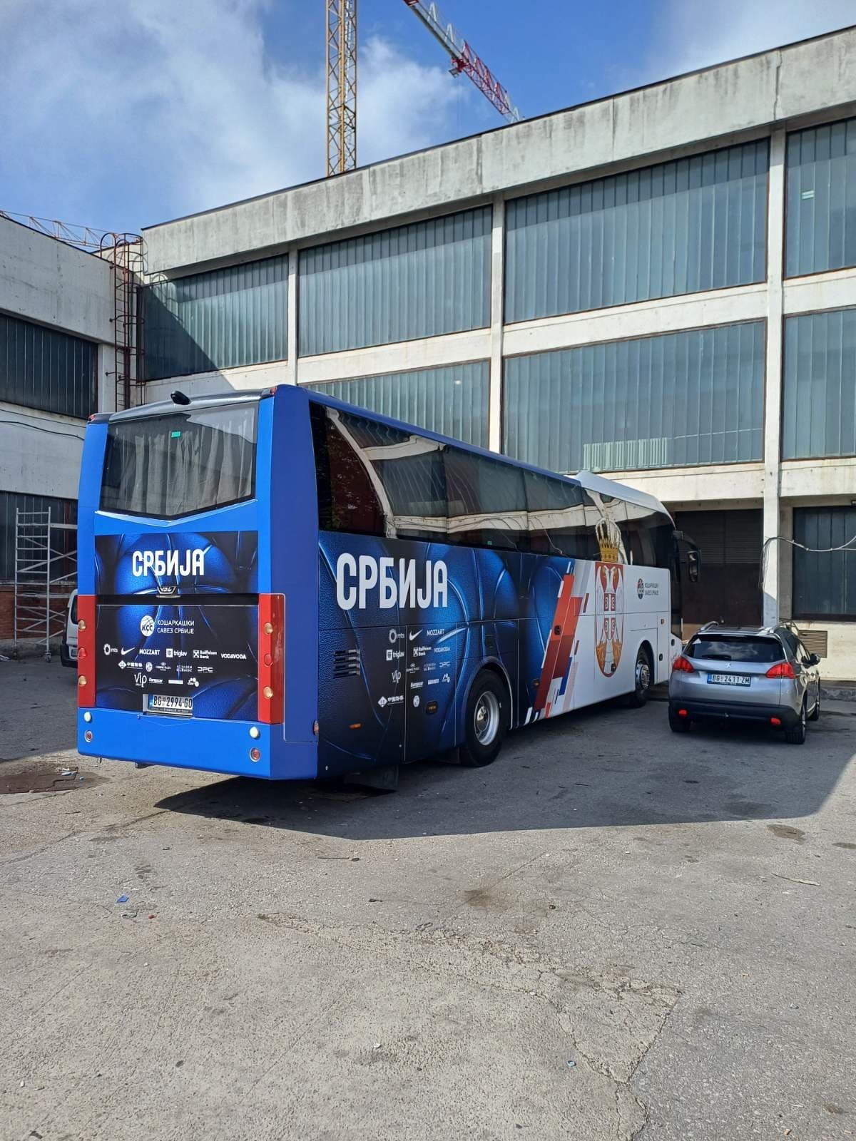 Coach in Basketball Federation of Serbia branding, rear view