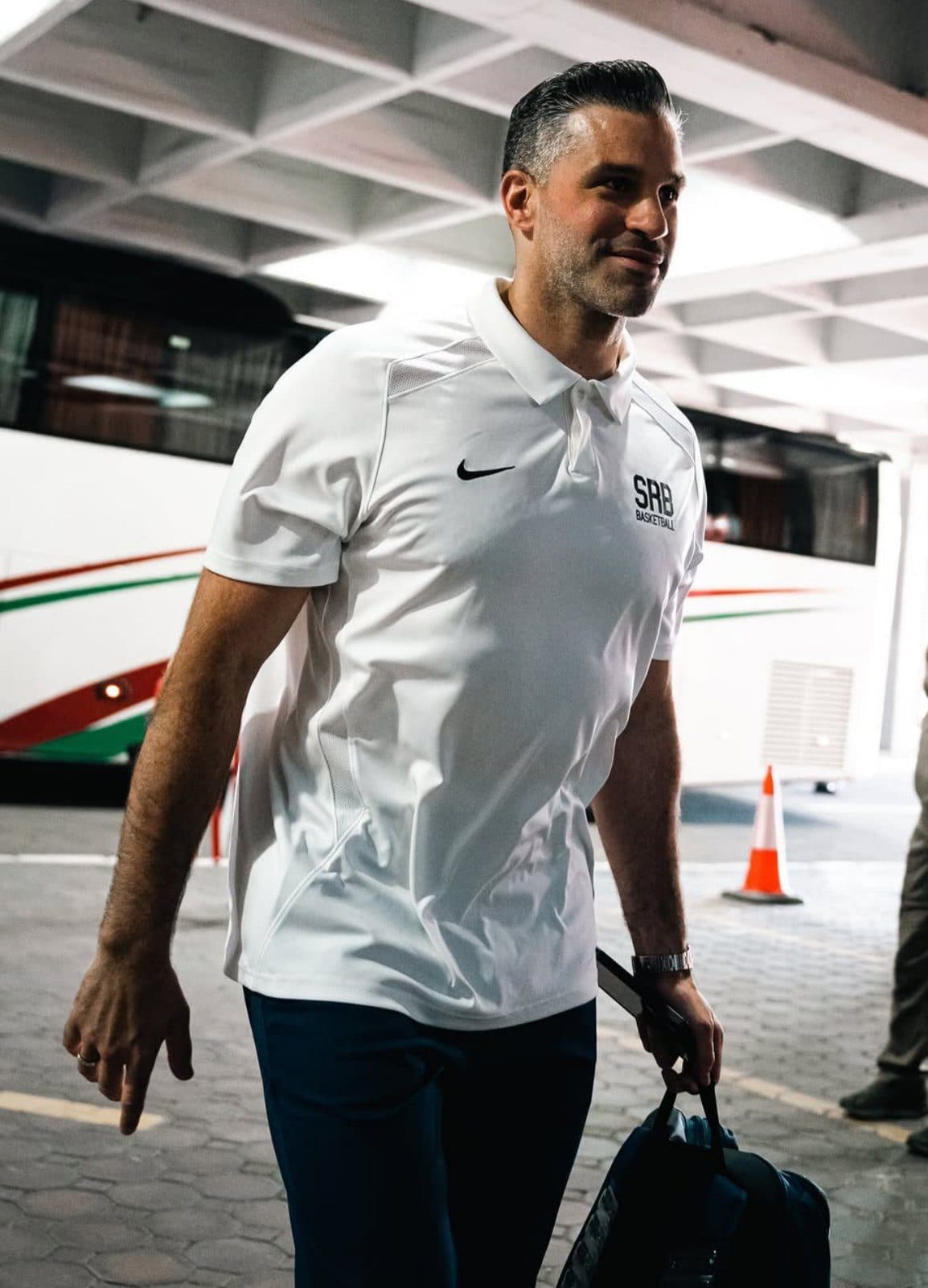 Serbian national team staff member beside the coach
