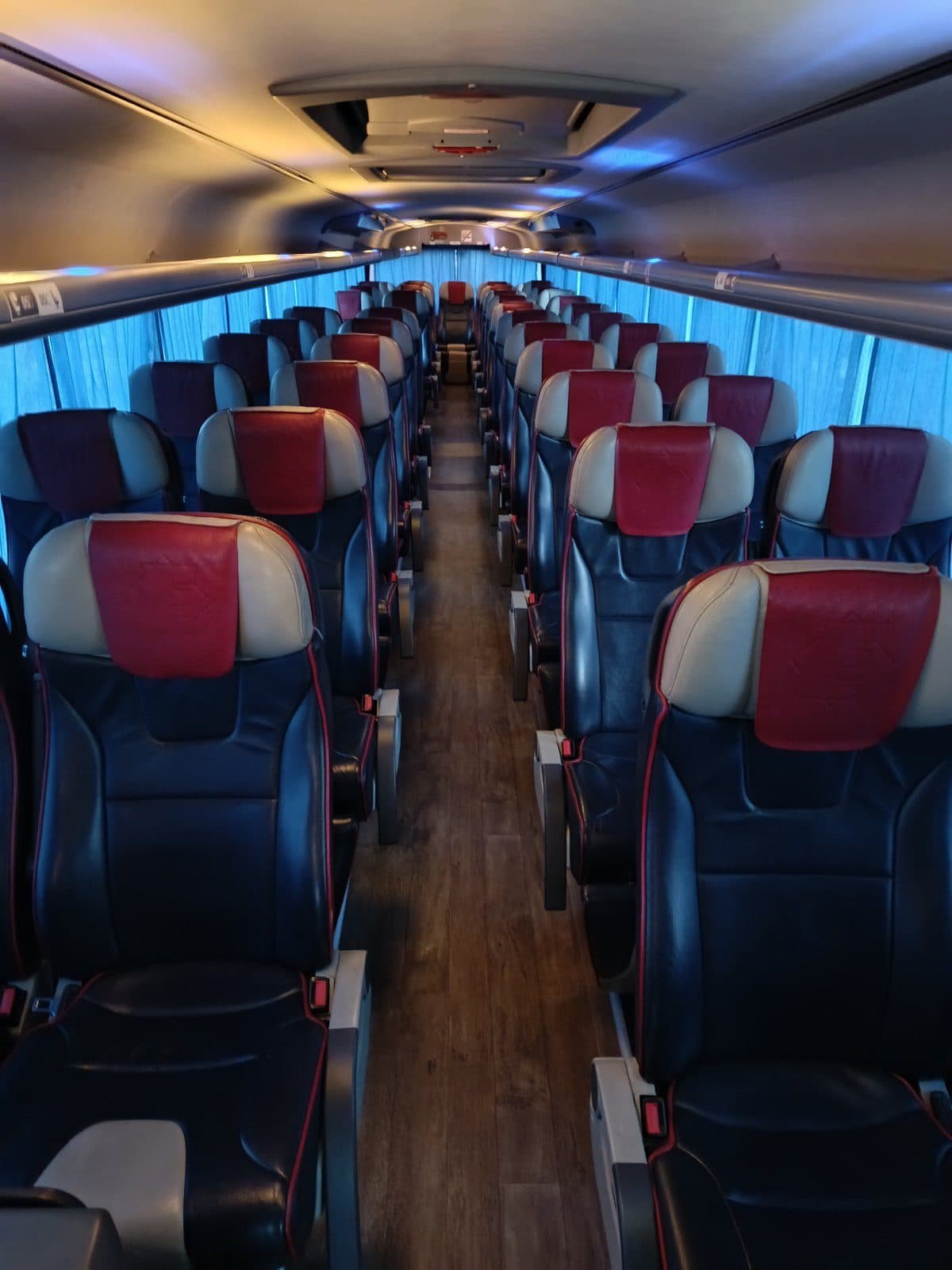 Interior of the VIP coach with blue ambient lighting