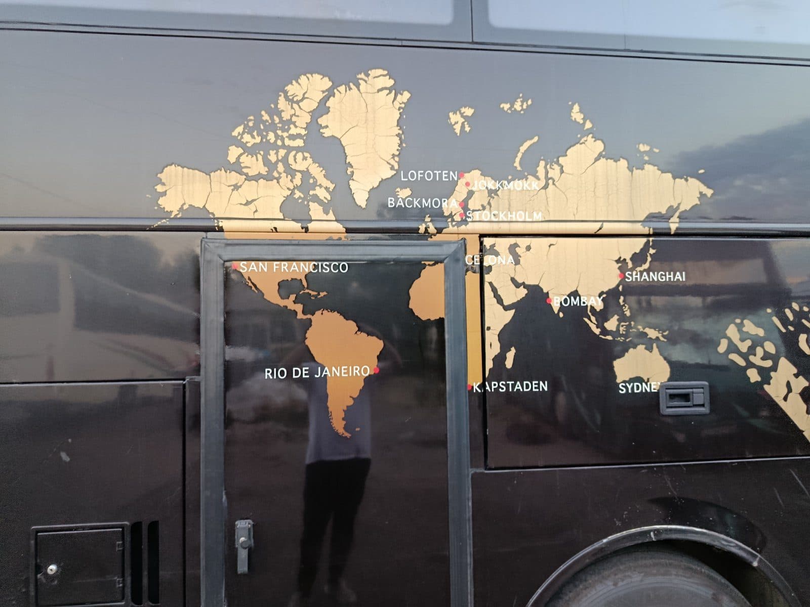 Gold world map on the side of the VDL Synergy VIP