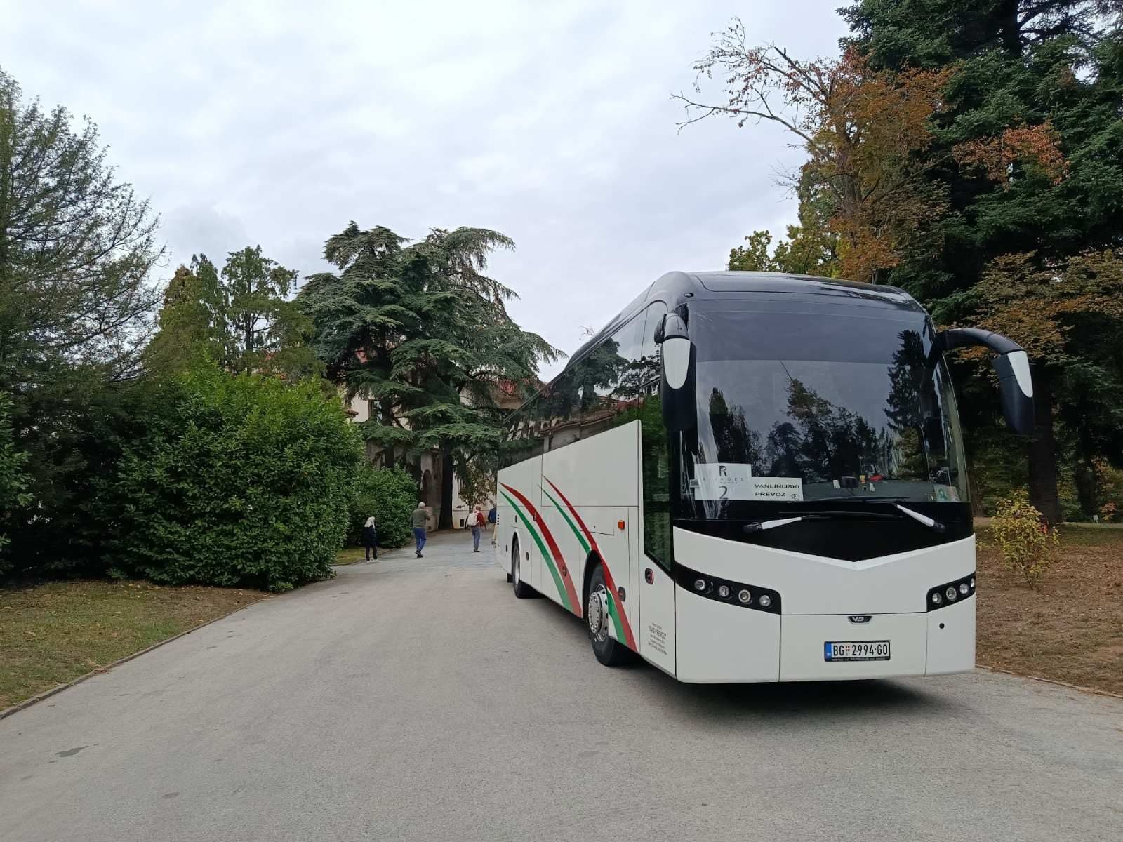 White BAS PREVOZ coach in a park in autumn